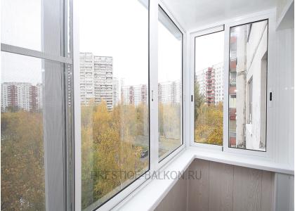 Холодное остекление балкона профилем Provedal с отделкой стен и потолка ламинированными панелями в Жуковском