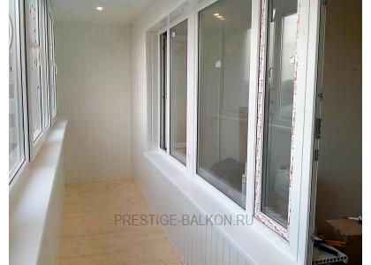 Теплое остекление балкона профилем rehau с утеплением и деревянной отделкой в Жуковском