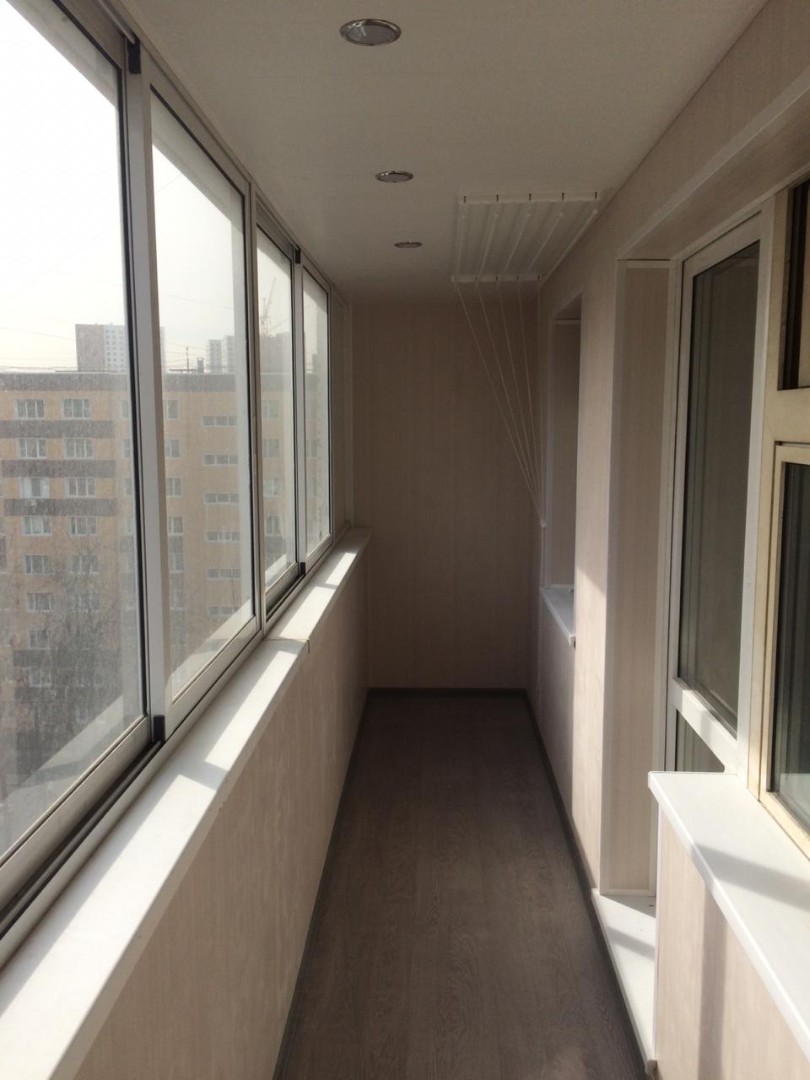 Теплое остекление балкона профилем KBE и установка сушилки в Жуковском